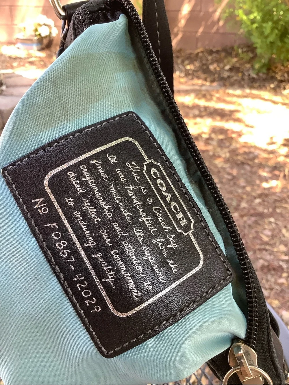 Coach Black Signature Messenger with Metallic Accent
